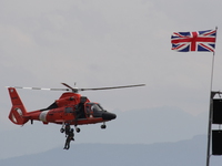hh-65 dolphin - us marine rescue helicopter with british flag 