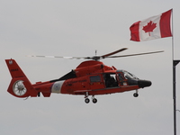 view--hh-65 dolphin - us marine rescue helicopter with canadian flag 