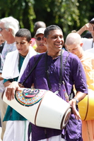 man playing white drum 