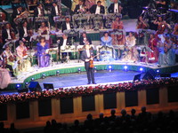 andre rieu inviting the audiences to sing with him 