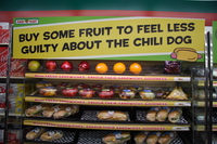 buy some fruit to feel less guilty about the chili dog 